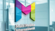 1. Kantor pusat MMIX dengan logo perusahaan, melambangkan strategi baru dan pembagian saham bonus. (Dok. multimed.co.id)