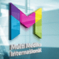 1. Kantor pusat MMIX dengan logo perusahaan, melambangkan strategi baru dan pembagian saham bonus. (Dok. multimed.co.id)